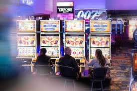 rollem bingo room interface showing numbered cards on mobile screen